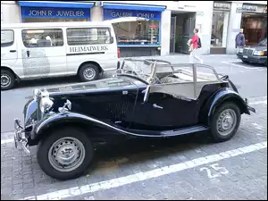Jaguar , opony, zderzak , światła