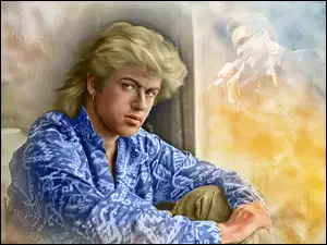 Portret brytyjskiego piosenkarza George a Michaela z zespołu Wham