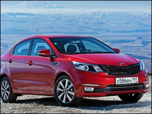 Czerwona Kia Sedan