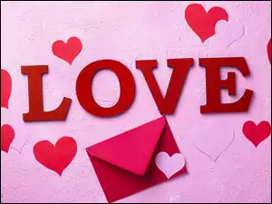 Napis love pośród serc