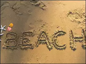 Plaża z napisem na piasku