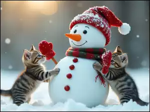 Bałwanek w czapce i szaliku i dwa małe szare kotki