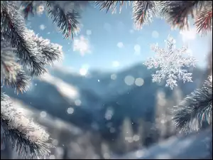 Śnieżynka i gałązki sosny w słońcu na tle gór