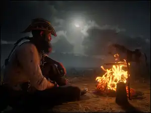 John Marston i koń przy ognisku