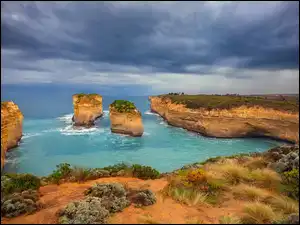 Australia, Wybrzeże, Chmury, Skały, Dwunastu Apostołów, Kolumny wapienne, Cieśnina Bassa, Klif, Morze, Park Narodowy Port Campbell