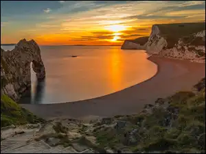 Zachód słońca, Hrabstwo Dorset, Durdle Door, Skały, Łuk, Wybrzeże Jurajskie, Morze, Anglia, Plaża
