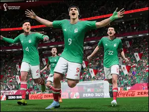 Zadowoleni piłkarze w zielonych koszulkach na boisku z gry FIFA 2023